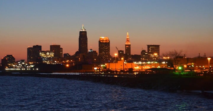 Cleveland skyline at sunrise over Lake Erie from Edgewater Park