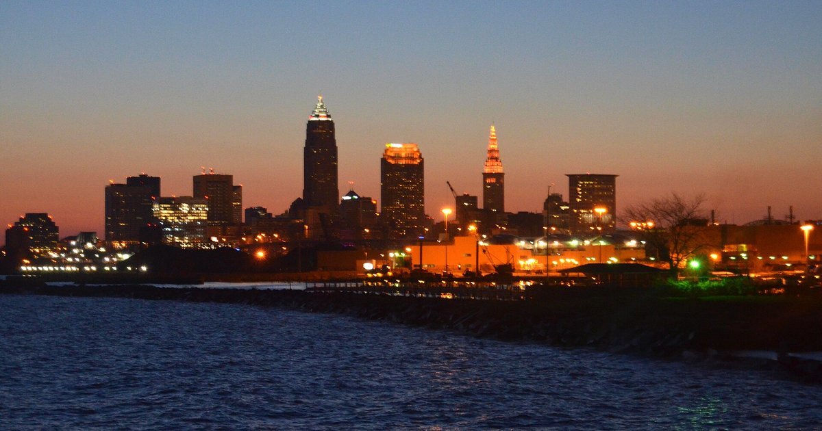 Cleveland skyline at sunrise over Lake Erie from Edgewater Park