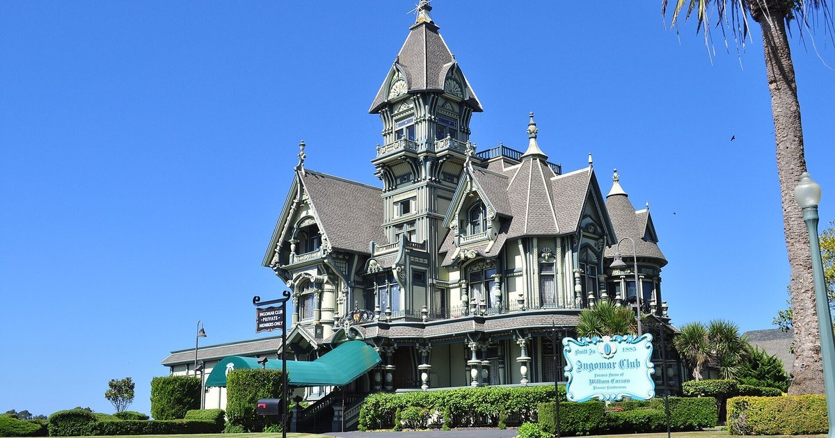 The Carson Mansion, an ornate Victorian house in Eureka, California, under a blue sky
