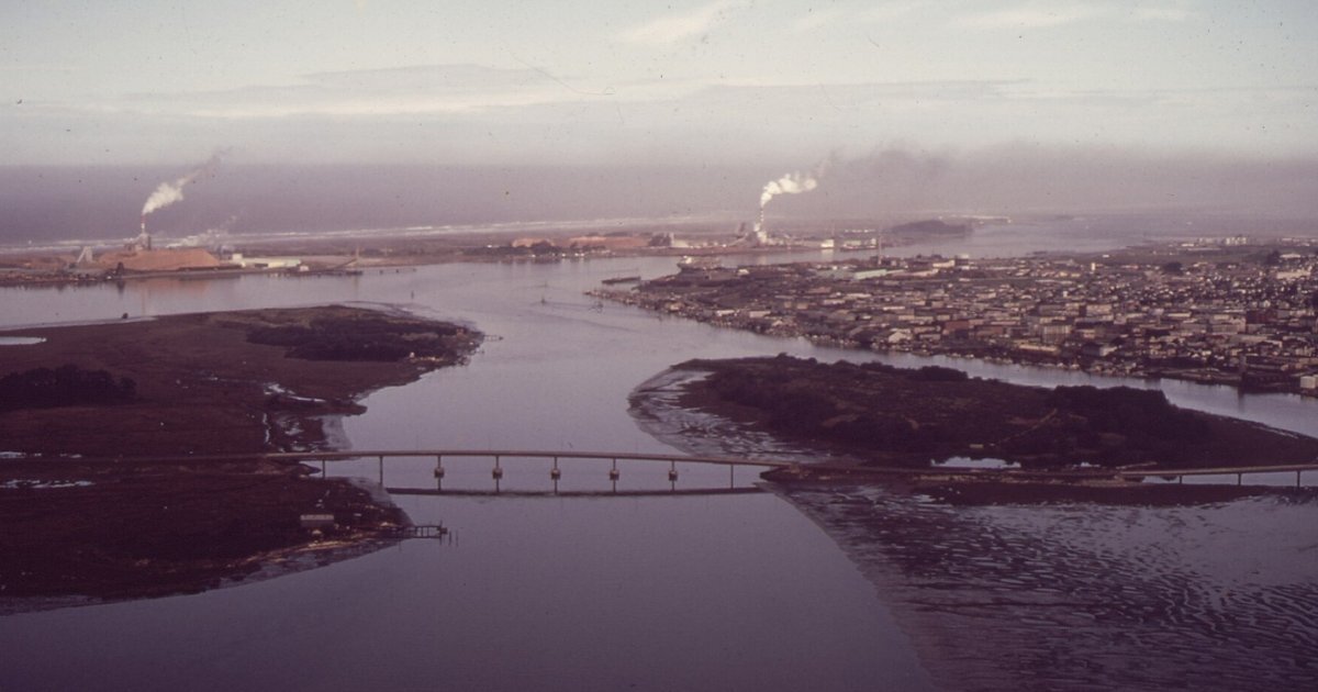 Aerial view of Humboldt Bay and Eureka, California, with a bridge crossing the bay