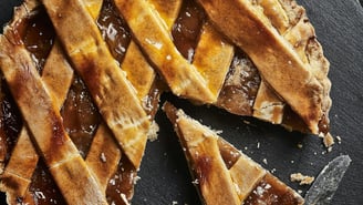 A freshly baked pie on a table, ready for a harvest bake-off
