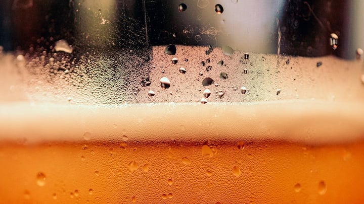 Glasses of golden cider and apples celebrating harvest season